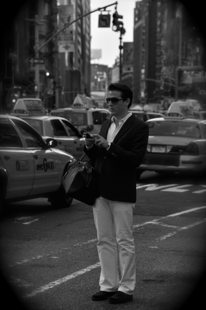 man waiting for a cab