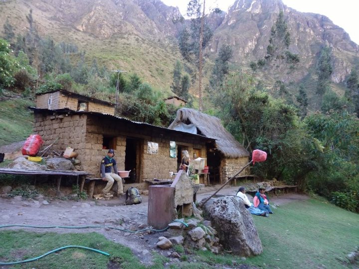 The pole sticking out with a red plastic bag lets travelers know this is a "chicharia" : Houses along the trail that sells chicha (fermented corn drink)
