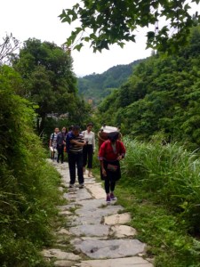 local carrying suitcase Longji rice terraces