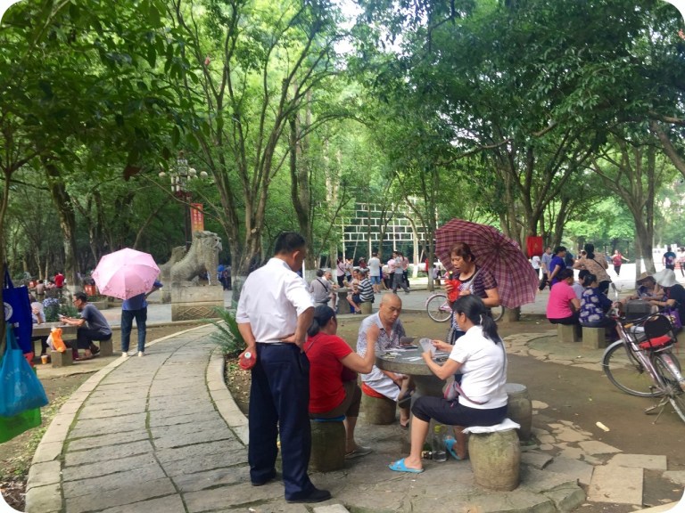 The elderly playing cards in the park